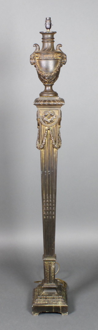A plaster Adams style standard lamp surmounted by an urn and raised on a tapering fluted column 58"h 