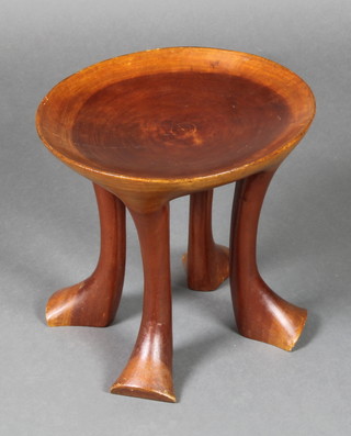 An "Ethiopian" Jimma turned stool, raised on 4 outswept supports 12" x 12" 