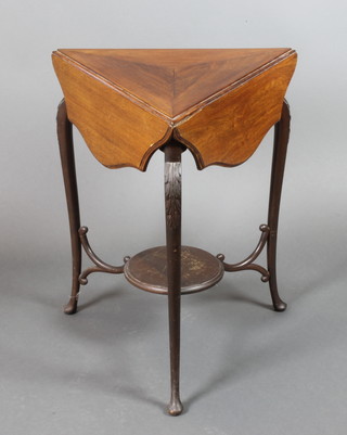A Victorian walnut triangular drop flap 2 tier occasional table, raised on carved cabriole supports with undertier 28"h x 20"w x 23"d x 27" x 27" when extended 