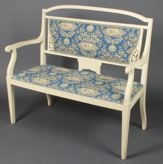 An Edwardian white painted carved mahogany double chair back settee with upholstered seat and back 36"h x 43"w x 18"d 