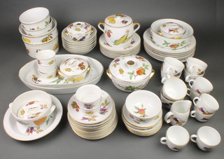 A quantity of Royal Worcester Evesham tableware comprising 6 coffee cups, 6 saucers, 6 tea cups, 6 saucers, milk jug, sugar bowl, 6 side plates, 6 medium plates, 6 dinner plates, serving dishes, 1 fruit bowl, 3 small lidded bowls, 1 large lidded bowl, 2 handled lidded bowl, 1 small bowl, 1 deep bowl, 3 casseroles, 1 serving bowl, 2 handled bowl, 6 dessert bowls 1 spare lid 