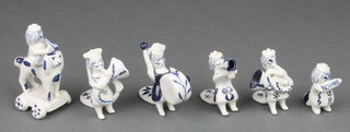 A Wilfred Gibson blue and white bisque porcelain band of musicians 2 1/2" 