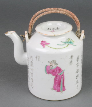 A Chinese famille rose teapot decorated with script and wicker swing handle 4 1/2"