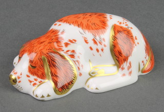 A Royal Crown Derby Japan pattern paperweight in the form of a sleeping puppy with gold plug 3 1/2" 