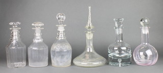 A mallet shaped decanter and stopper with hobnail cut decoration 12" and 5 other decanters