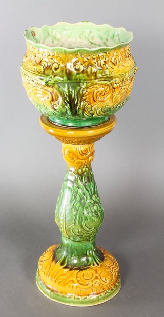 An Art Nouveau green jardiniere on a later baluster base 32" 