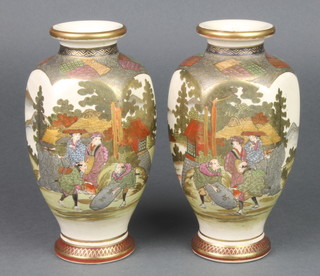 A pair of early 20th Century Satsuma hexagonal vases with figures in extensive landscapes 7 1/2" 