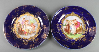 A pair of early 20th Century Austrian transfer print plates decorated with figures after Kaufman 7 1/2" 