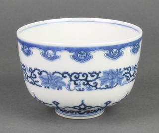 A Chinese blue and white deep bowl decorated with formal scrolling flowers, bearing a 6 character Kang Hsi mark 3 1/2" 