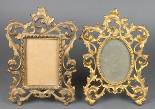 A 19th Century pierced gilt metal easel photograph frame 10" x 8" and 1 other 10" x 7 1/2" 