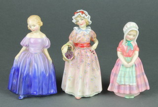 A Royal Doulton figure - Tootles HN1650 4 1/2", a ditto Marie 4 3/4" and another Cerise HN1607 5" 