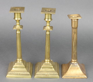 A pair of 19th Century brass Adam style candlesticks with detachable sconces 10" and 1 other 9" (old solder repair to base) 