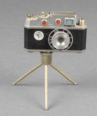 An Orion lighter in the form of a camera and tripod 