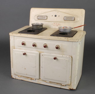 Amersham Toys, a tin plate model stove with hotplate, 2 saucepans and double oven  12" x 11 1/2" x 7" 