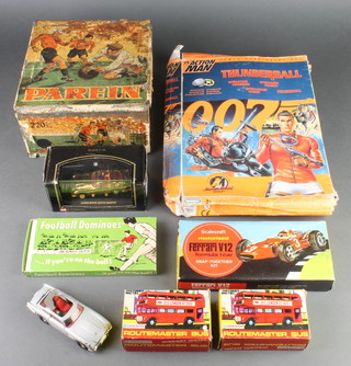 A James Bond Thunderball Action Man boxed (slight damage to box), a Corgi 007 Aston Martin DB5 in silver, a Corgi 007 Special Edition James Bond Aston Martin boxed, a Scalecraft 2 Lone Star Routemaster double decker boxes boxed, a football domino game boxed and a Parein tin decorated footballers 