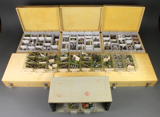 6 shallow boxes containing a collection of various lead figures and a plastic table top chest of 12 drawers containing lead soldiers, cannons, etc 