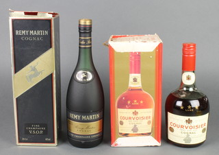 A 70cl bottle of Remy Martin cognac and a 24 ozs bottle of Courvoisier Trois Etoiles Luxe Cognac 