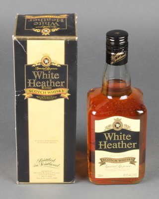 A 70cl bottle of  Glenfiddich malt whisky together with a  700ml bottle of White Heather blended Scots whisky
