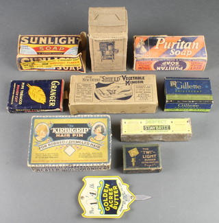 A packet of Puritan Soap, ditto Sunlight Soap, packet of Granger Pipe Tobacco, a price sign for Golden Acres Butter and other packaging  