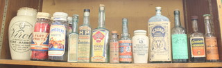 A Cary Cocks and Roper Herefordshire Sauce bottle, a Garton's HP Sauce bottle, a Godalls Mushroom Ketchup bottle and other bottles 