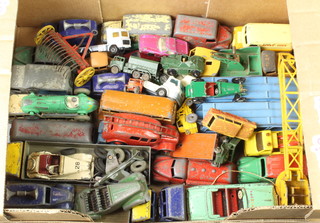 A collection of Dinky toy model cars, play worn