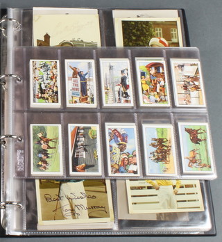A collection of Gallagher's Famous Jockey cigarette cards and a collection of postcards depicting Jockeys and race courses 