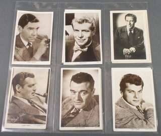10 black and white postcards of film stars - Robert Batty, Clark Gable etc