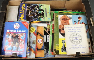 A box of football programmes and other related ephemera