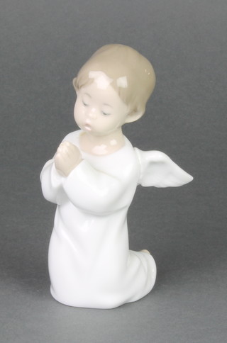 A Lladro figure of a kneeling praying angel 4538 5", boxed