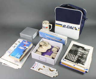 A B.Cal flight bag and various  British Caledonian related photographs etc 