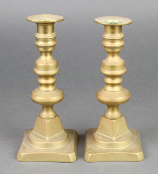 A pair of 19th Century brass candlesticks 8" (1 stem slightly loose)
