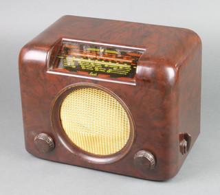 A Bush type DAC.90.A radio serial no. 73/32355 contained in a brown Bakelite case (slight dent to speaker)