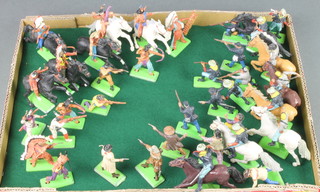 A collection of 36 Britains figures including cowboys, Indians and US Cavalry soldiers 