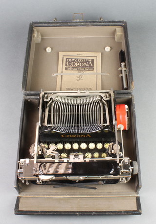 A Corona 3 portable typewriter complete with instructions