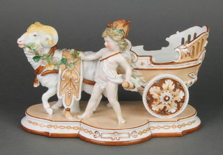 A 19th Century KPM centre piece in the form of an Angel beside a cart being drawn by a ram, mark to base 10 1/2" 