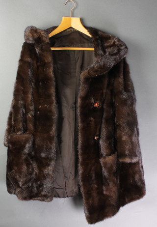 A lady's brown mink fur coat