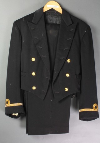 A Royal Naval Lieutenant Commander's tunic by Gieves together with a Sub Lieutenant Mess Kit jacket and trousers by Gieves (has had moth) 