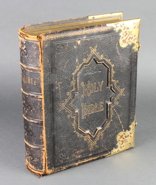 Jones and Jones, a leather bound Holy Bible with metal mounts (slight wear to spine) 
