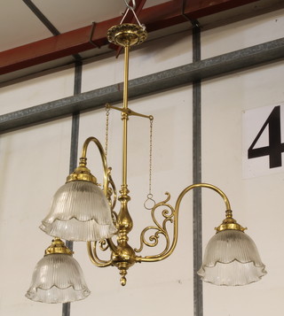 A Victorian gilt metal 3 light gas lamp with reeded glass shades (converted to electricity)