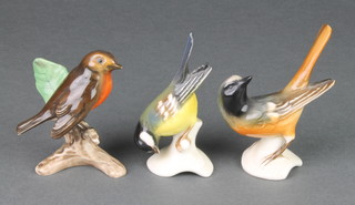 Three Goebels figures of birds - Great Titmouse 3 1/2", Red Start 4" and Robin 3" 