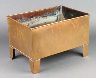 A rectangular copper planter raised on panelled supports 9" x 14" x 9 1/2"
