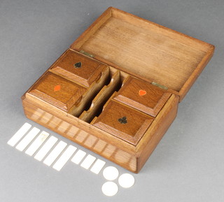 A rectangular oak card box the hinged lid decorated  Royal Naval crest and containing 4 rectangular boxes containing 20 circular bone counters (1 damaged), approx. 77 2" bone counters and  19 1" rectangular bone counters  
