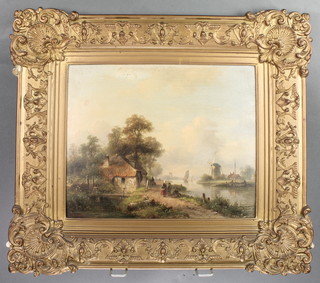 A 19th Century Dutch oil on board, signed, figures beside a canal with distant windmills and buildings, indistinctly signed 10" x 12" 