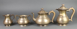 A silver octagonal 4 piece tea set with fruitwood handles, London 1916, 2202 grams gross 