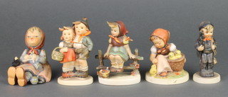 Five Hummel figures - girl with chicks 57/0 3 1/4", chimney sweep 122/0 4", a seated girl with bird 69 3", a girl on a stile 112 3/0 4" and a girl and boy 94 3/0 4" 
