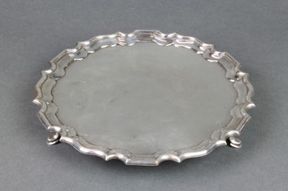 A silver card tray with pie crust rim on hoof feet Sheffield 1925, 382 grams, 8 1/4" 