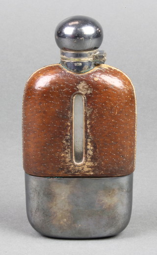 An Edwardian silver plated mounted leather hip flask with cup base 