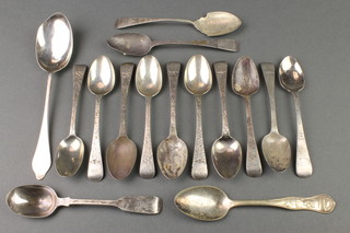 A matched set of silver teaspoons with bright cut decoration and monogram, a Georgian dessert spoon and 4 other spoons, mixed dates, 254 grams