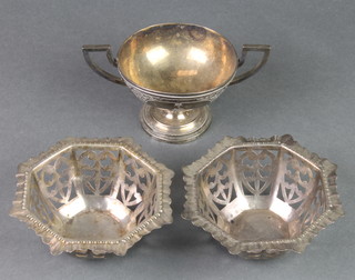 A pair of Edwardian pierced silver octagonal bon bon dishes and a Continental 2 handled cup 160 grams