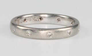 A platinum and diamond eternity ring, size L 